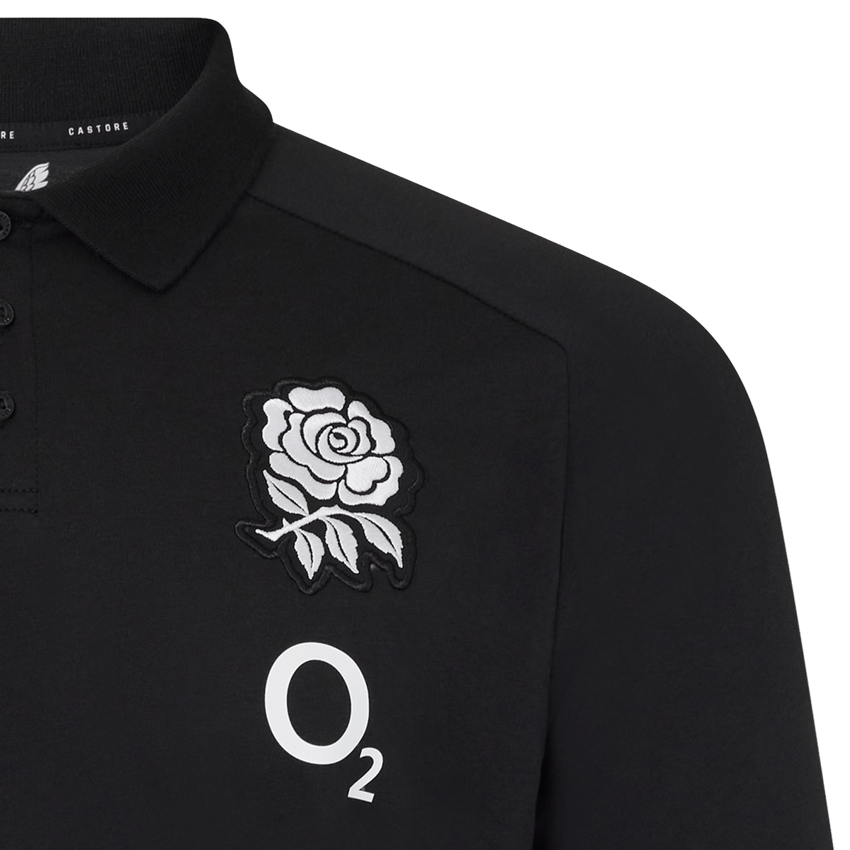 The England 26/27 Off-Pitch Polo by Castore features a stylish design with a white rose emblem and "O₂" logo on the chest—perfect for England Rugby fans looking for smart off-pitch attire.