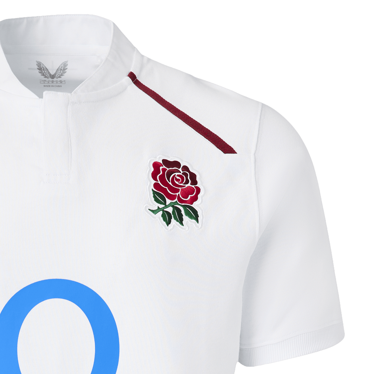 The England 26/27 Classic Home Jersey by Castore features a white design with a maroon rose emblem, thin maroon shoulder stripe, and a large blue "O"—a must-have for rugby fans.