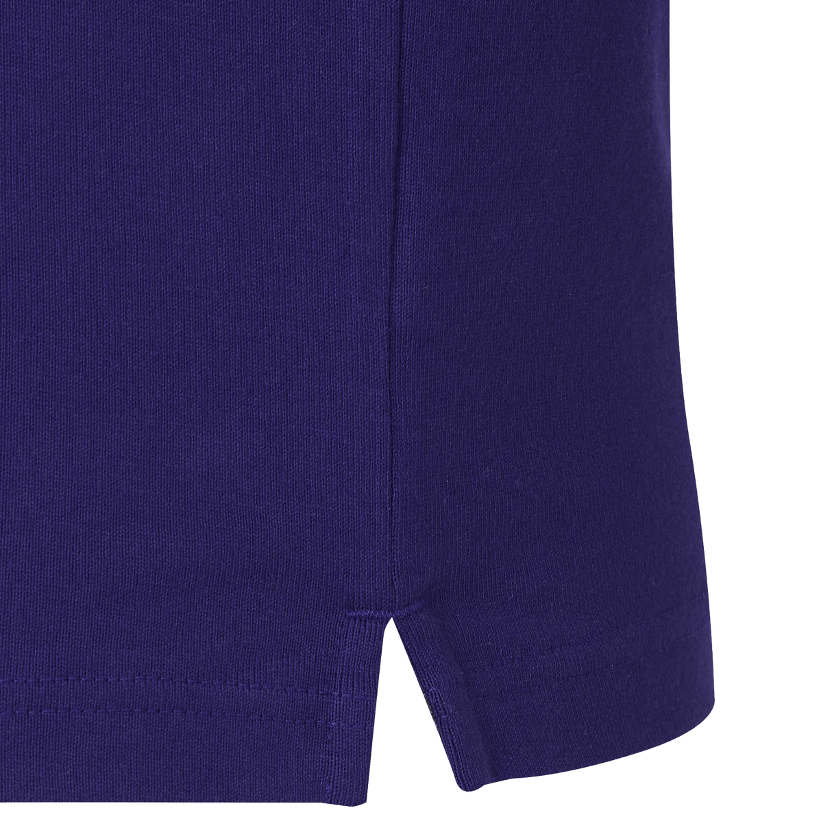 Close-up of the hem on the England 26/27 Classic Long Sleeve Alternate Jersey by Castore, featuring a small side slit and visible stitching detail.