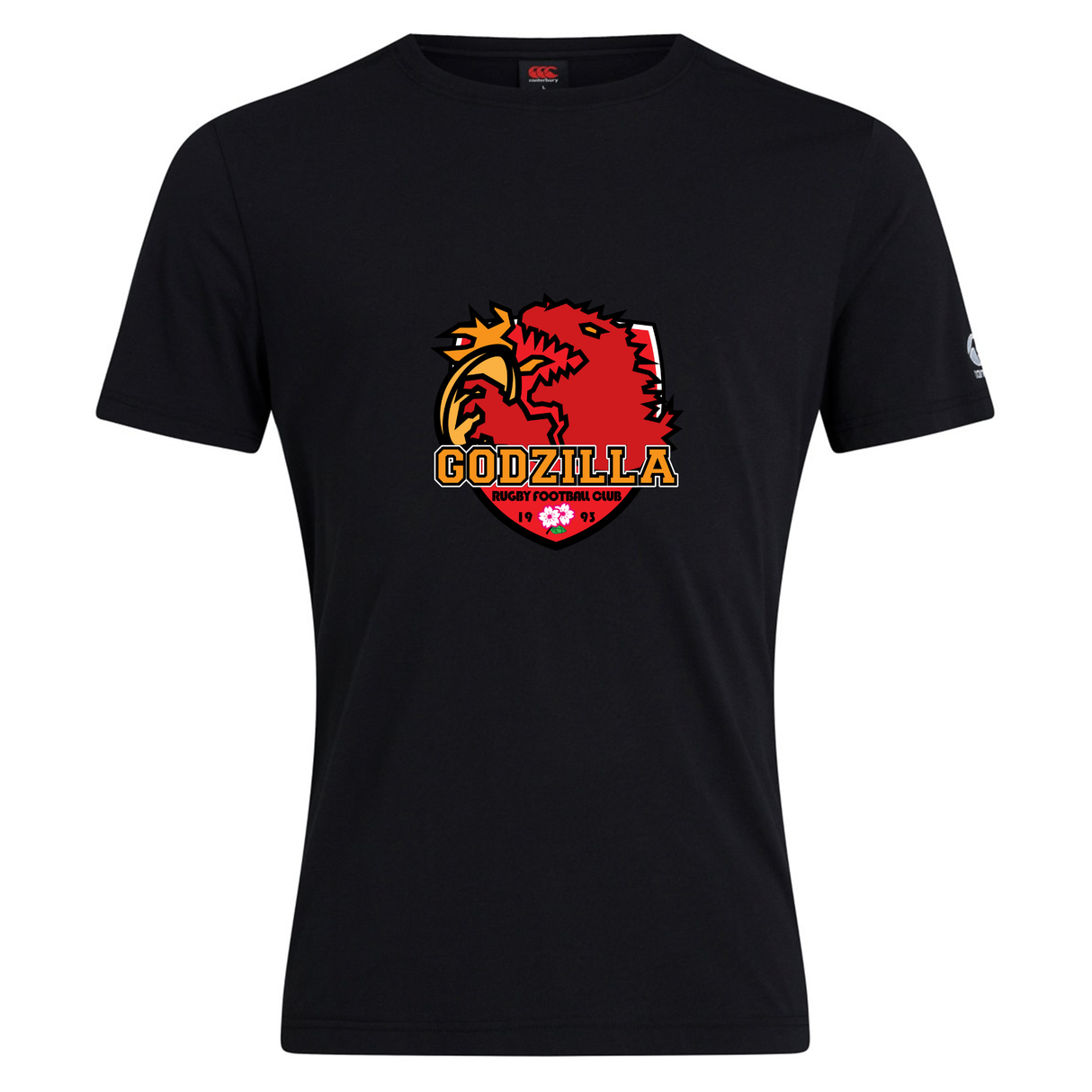 The Godzilla Rugby Football Club Club Plain Tee by Canterbury, from WRS Canterbury, is a black short-sleeve cotton blend t-shirt featuring a striking red and yellow dragon crest logo with “Godzilla Rugby Football Club” printed on the front. This customizable tee offers both comfort and bold style, making it ideal for showcasing team spirit or for everyday wear.