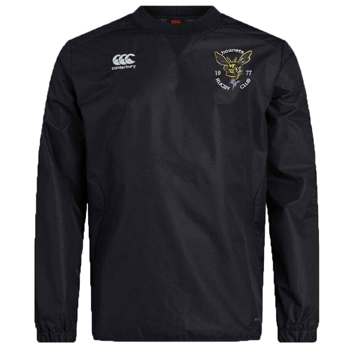 A black long-sleeve Hornets Rugby Club 1977 Club Vaposhield Contact Top by EMB Canterbury, featuring the Canterbury logo on the right chest and a Hornets Rugby Club emblem on the left chest. This custom rugby top is equipped with Vaposhield technology, providing durable comfort and protection for every training session.
