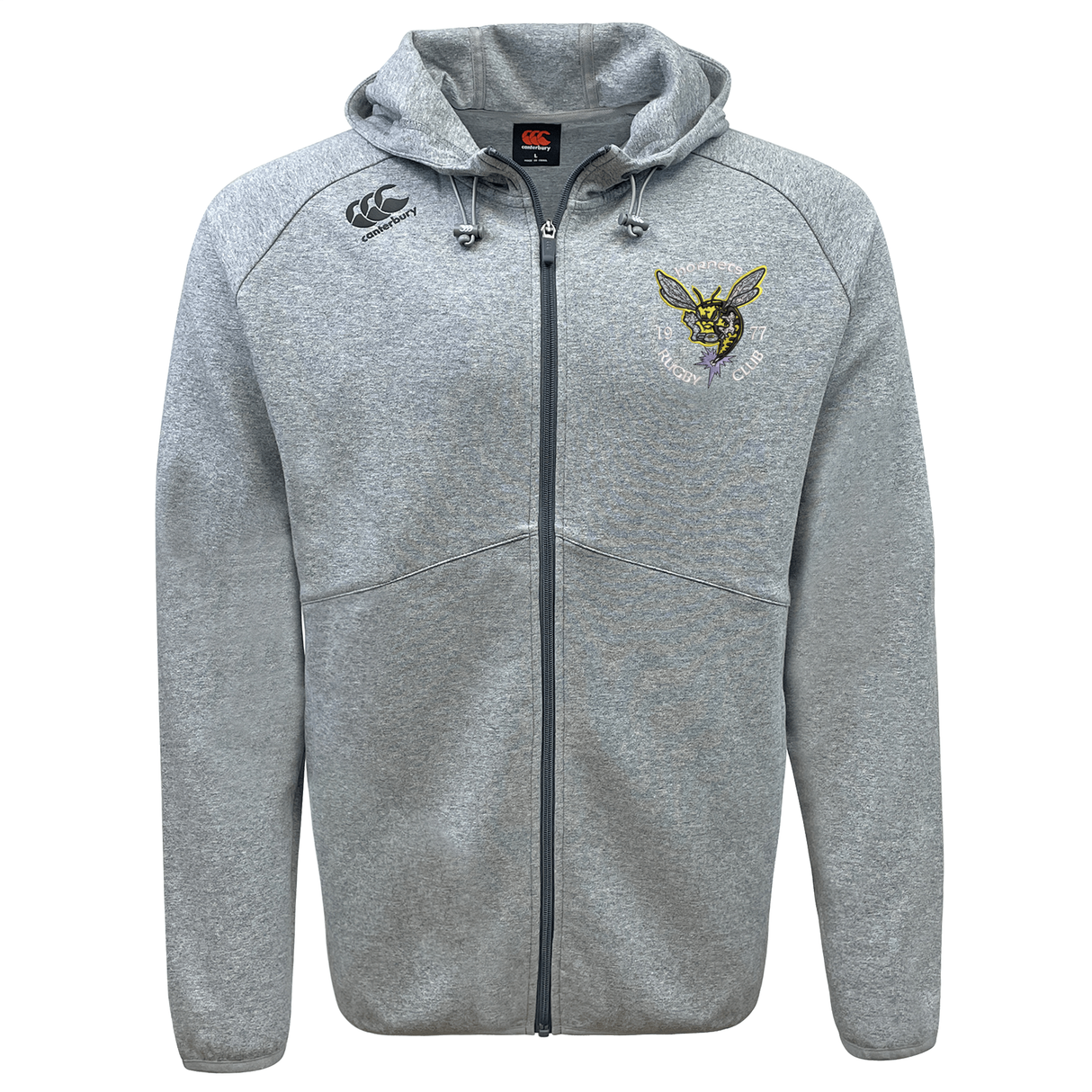Introducing the Hornets Rugby Club 1977 Tempo Vapodri Full-Zip Hoodie by EMB Canterbury—a light grey hoodie designed with a practical zip-up front, cozy hood, and convenient front pockets. This Canterbury-branded hoodie features an embroidered yellow hornet logo on the left chest and a sleek black EMB Canterbury logo on the right chest. Its moisture-wicking Vapodri fabric ensures you stay comfortable throughout the day, while the stylish black zipper adds a modern touch.