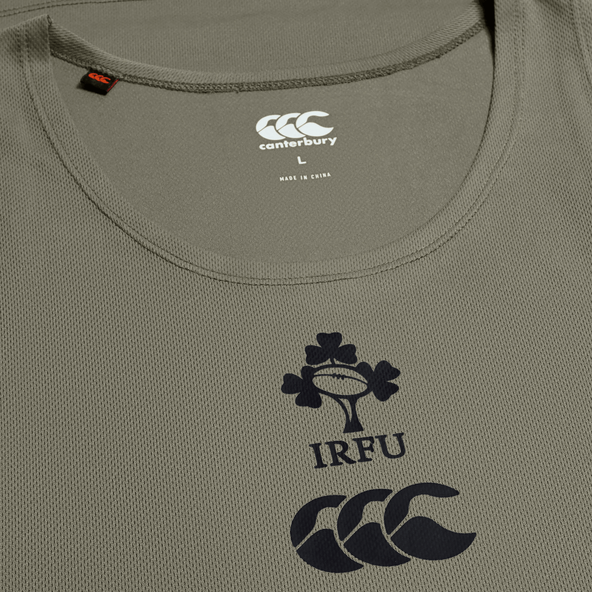 Close-up of the Ireland 25/26 Poly Training Singlet by Canterbury, showcasing the IRFU logo, Canterbury branding, and inner collar print with size and origin—ideal for any Ireland Rugby collection.
