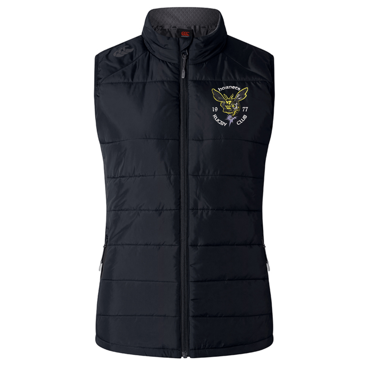The Hornets Rugby Club 1977 Women's Elite Microlite Gilet by Canterbury features a black, sleeveless insulated design with a front zipper, two side pockets, and an embroidered "Hornets Rugby Club 1977" logo on the left chest. Crafted by EMB Canterbury, this women's elite gilet is constructed with Thermoreg fleece for enhanced warmth and performance.
