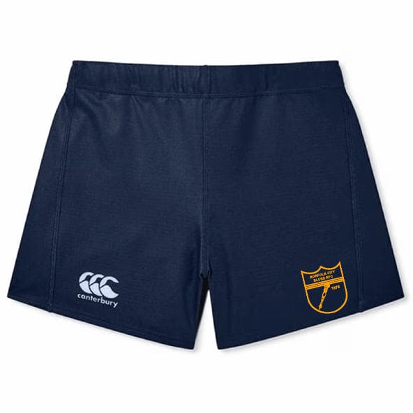 The Norfolk Blues Women's Yokohama Short by EMB Canterbury is navy blue with a white Canterbury logo and a yellow shield emblem on the right leg, crafted from Vapodri fabric for peak performance.