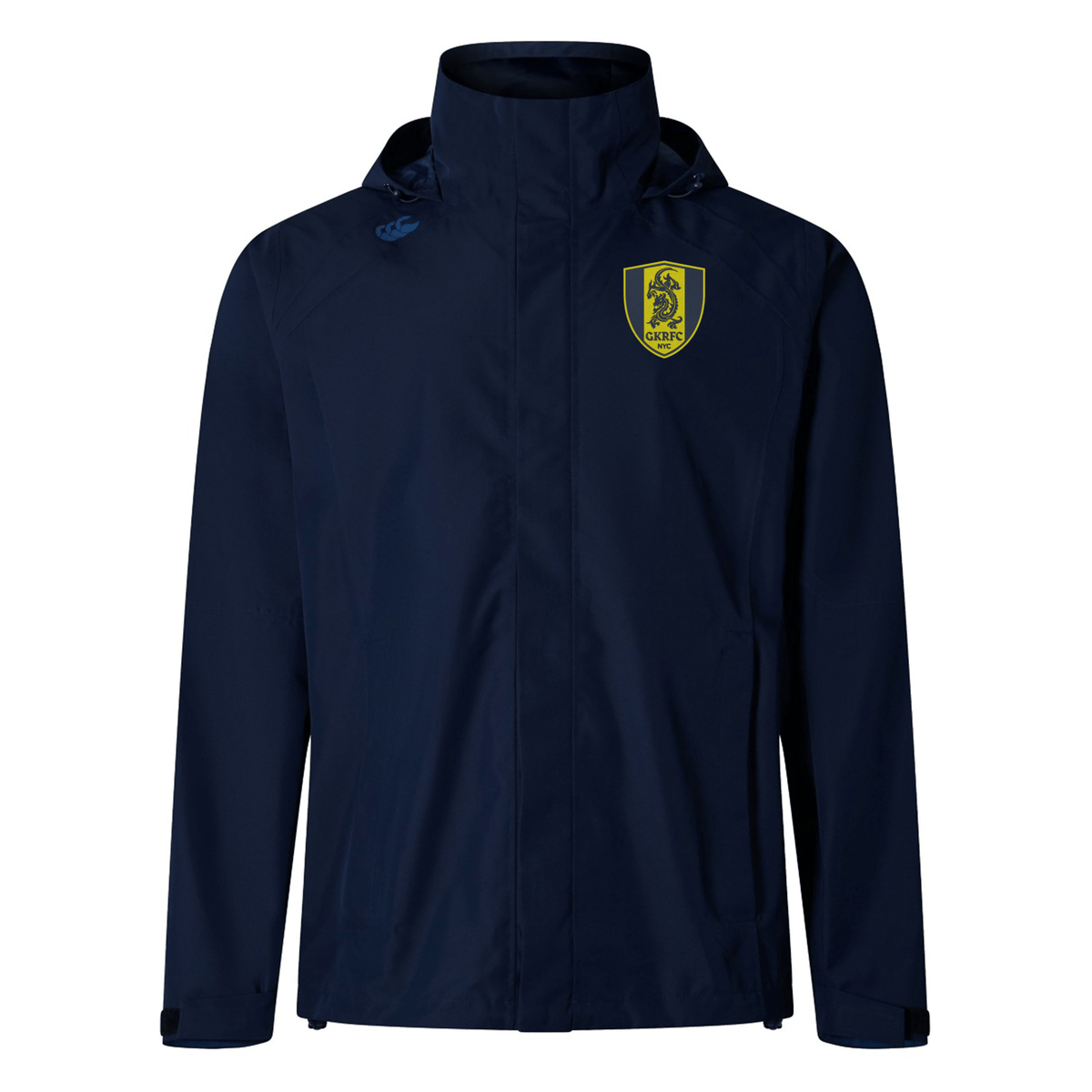 The Gotham Knights Elite Storm Jacket by Canterbury, in navy blue, features a high collar and hood along with a yellow and black emblem on the left chest. This jacket by EMB Canterbury offers Vaposhield performance for ultimate pitchside coverage.