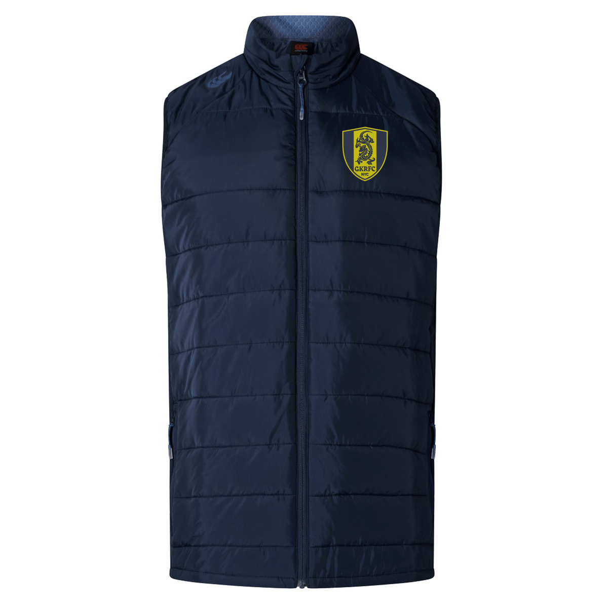 A navy blue sleeveless puffer vest featuring a high collar and a yellow emblem with a black horse on the left chest. The Gotham Knights Elite Microlite Gilet by EMB Canterbury has insulated baffles and a front zipper closure for extra warmth.