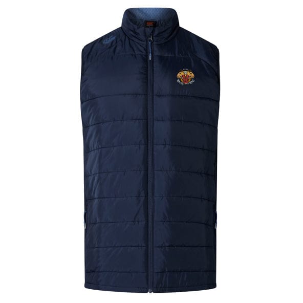 The Wiregrass Rugby Women's Elite Microlite Gilet by Canterbury is a navy blue puffer vest with insulated baffles and a high collar, featuring Thermoreg technology for warmth. It includes an embroidered logo on the chest and is completed with a sleek front zipper.