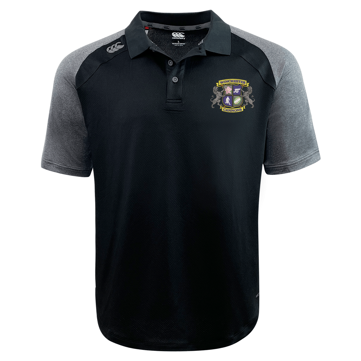 The Winchester Cannons Elite Polo by EMB Canterbury is a black and gray short-sleeve shirt with a crest and ribbon emblem on the left chest, Canterbury logo on the right shoulder, and lightweight Vapodri fabric for comfort.