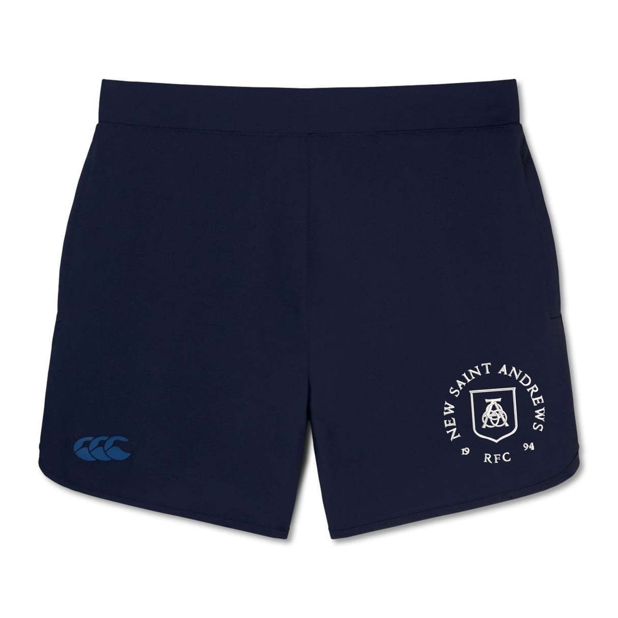 Navy blue New Saint Andrews College Elite Woven Shorts by EMB Canterbury, featuring a white New Saint Andrews RFC crest on the right leg and a blue Canterbury logo on the left leg. Designed for active performance, these shorts also include zippered pockets for secure storage.