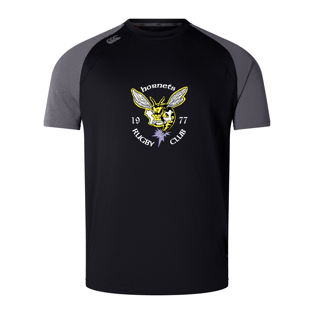 Introducing the Hornets Rugby Club 1977 Elite Training Tee by WRS Canterbury: a black rugby shirt with gray short sleeves, made from Canterbury’s advanced Vapodri fabric for exceptional comfort and moisture wicking. Showcasing a striking yellow hornet logo and "Hornets Rugby Club 1977" text on the chest, this tee is ideal for displaying your team pride both on and off the field.