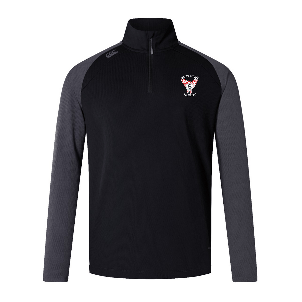 The EMB Canterbury Superior Rugby Club Elite First Layer features a black body, dark gray sleeves, and a Superior Rugby logo on the left chest, crafted in the signature Canterbury style.