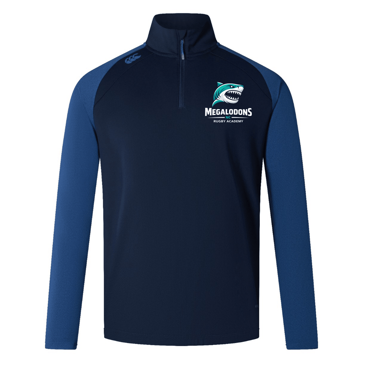 The EMB Canterbury NC Rugby Academy - Megalodons Elite First Layer is a navy and blue quarter-zip rugby top with the academy logo, a stylized shark on the left chest, and features advanced VapoDri technology for performance.