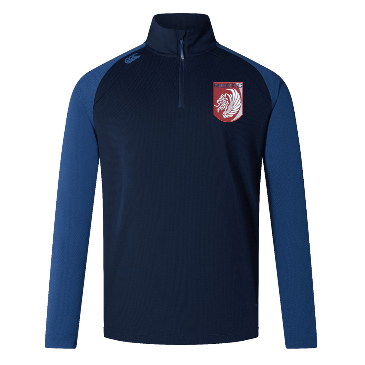 The Montgomery Bucks Griffins Elite First Layer by EMB Canterbury is a navy and blue long-sleeve rugby top with a quarter-zip, white lion crest, "MERIT" on the left chest, VapoDri tech, and a small logo on the right shoulder.