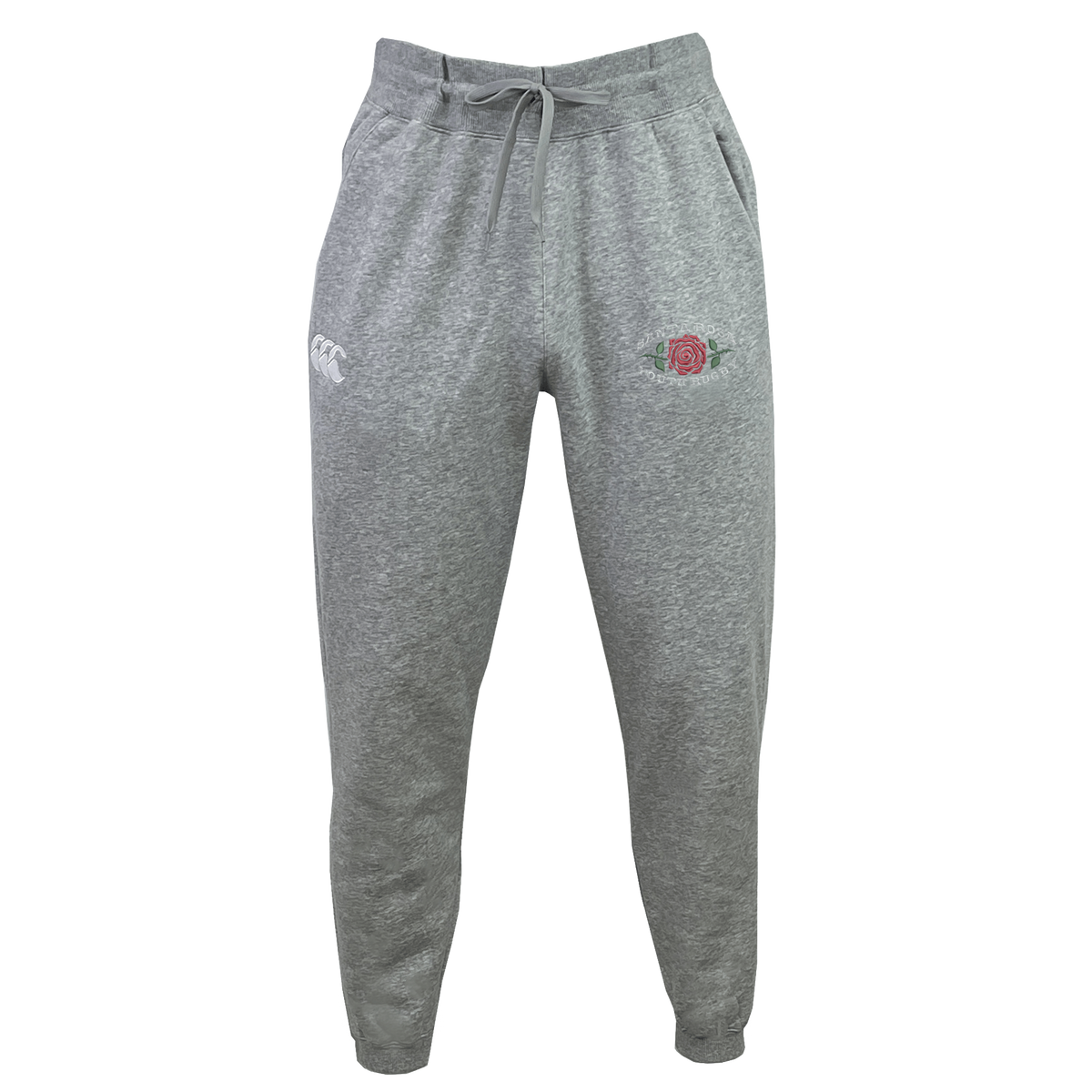 The Santa Rosa Youth Rugby Leisure Sweatpant by EMB Canterbury features soft gray recycled polyester fleece, an elastic waistband with drawstring, cuffed ankles, a white Canterbury logo on the left thigh, and a red rose emblem on the right thigh—all showcased against a plain background.