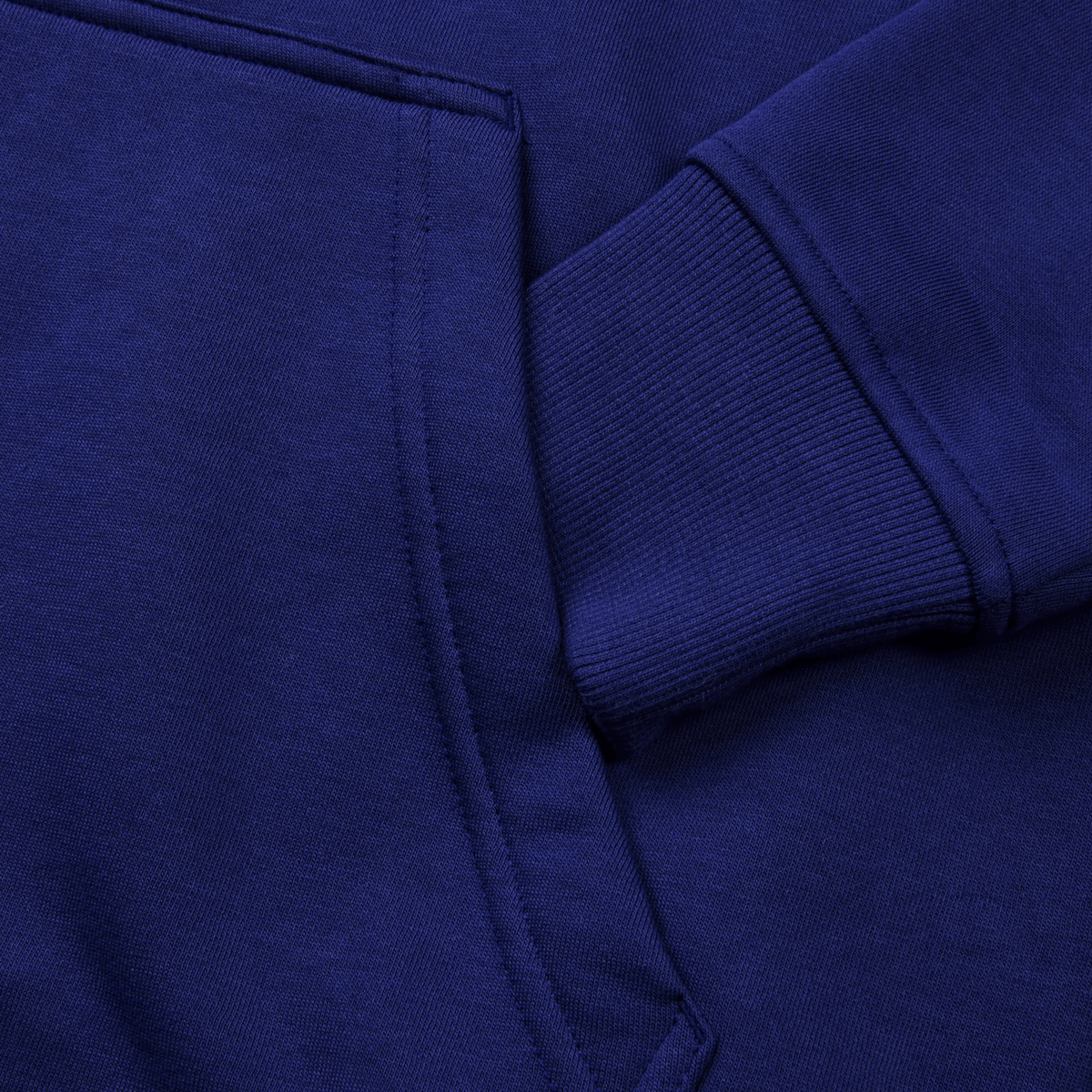 Close-up of the Canterbury Women's Uglies Hoodie in blue, showcasing a large pocket and ribbed sleeve cuffs with a flattering women's cut.