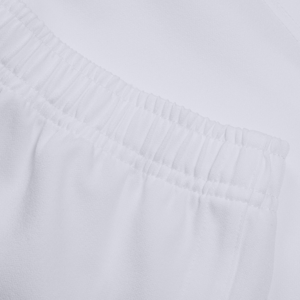 Close-up of the waistband on the Canterbury Professional Short 2.0, showcasing its elasticated band with gathered fabric and durable stitching.