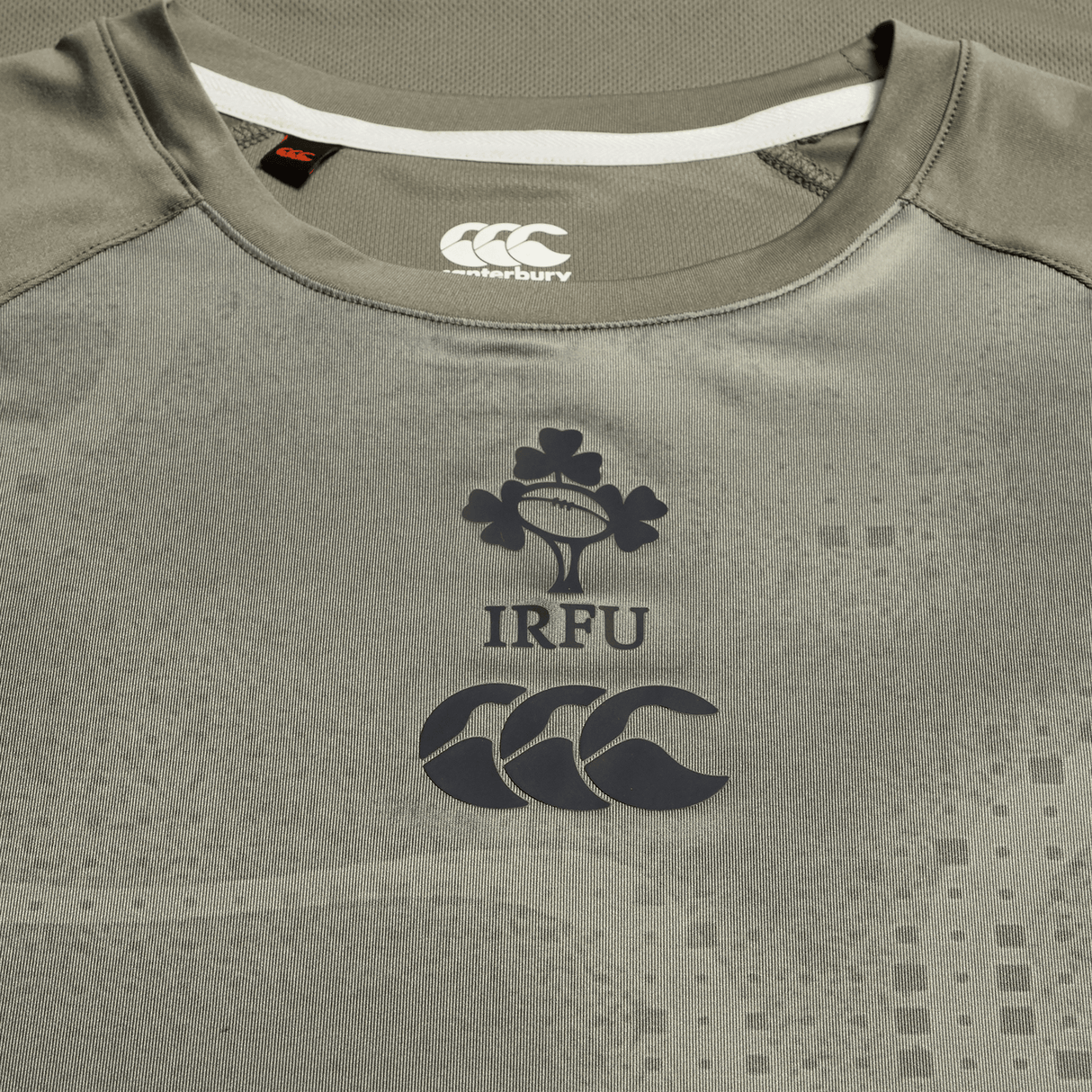 Close-up of the Ireland 25/26 Superlight Training T-Shirt by Canterbury, featuring the IRFU logo and two Canterbury logos on the chest. This superlight tee is ideal for comfort and performance during intense training sessions.