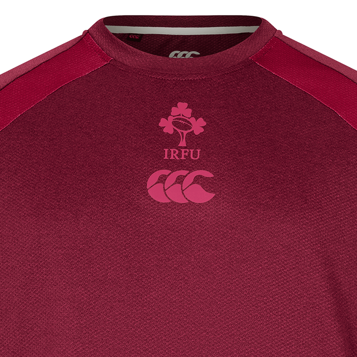 Close-up of the Ireland 25/26 Autumn Internationals Elite Training Tee by Canterbury, featuring the IRFU shamrock and Canterbury logos on the chest. Made with Vapodri technology for enhanced performance.