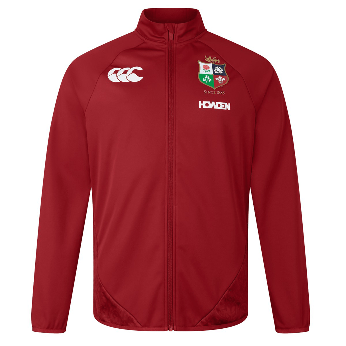 The British & Irish Lions 2025 Anthem Jacket by Canterbury features a red design with white logos, including a coat of arms and text. It has a full front zip, stand-up collar, and long sleeves.