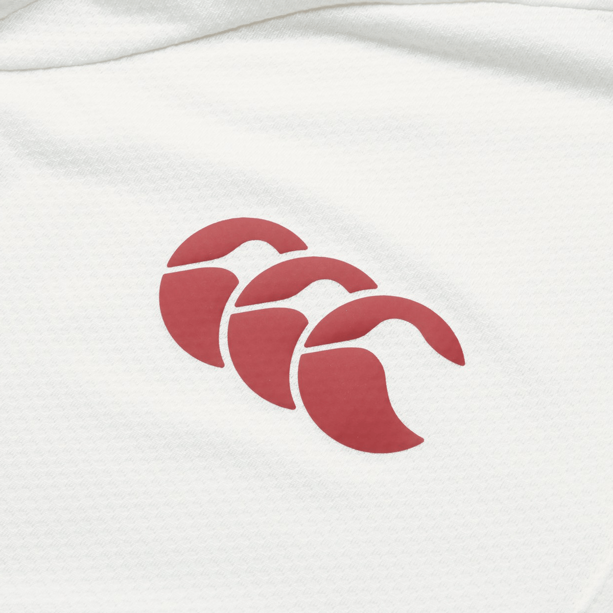 White breathable wicking fabric featuring a red three-headed Canterbury logo, ideal for the British & Irish Lions 25 Poly Polo by Canterbury.