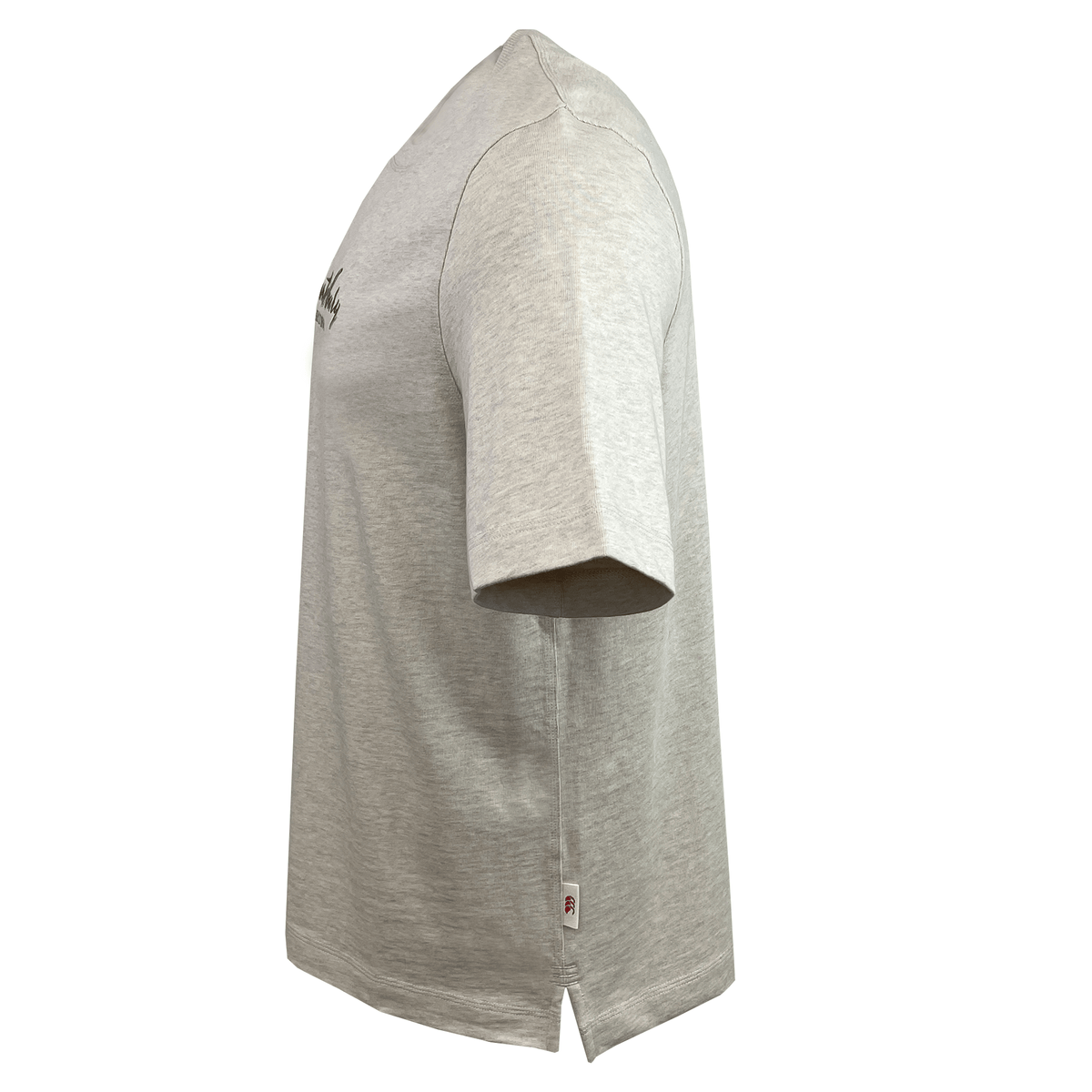 Side view of a light gray Canterbury Heritage Script T-Shirt, featuring short sleeves and a small logo tag near the bottom hem, crafted from soft organic cotton.