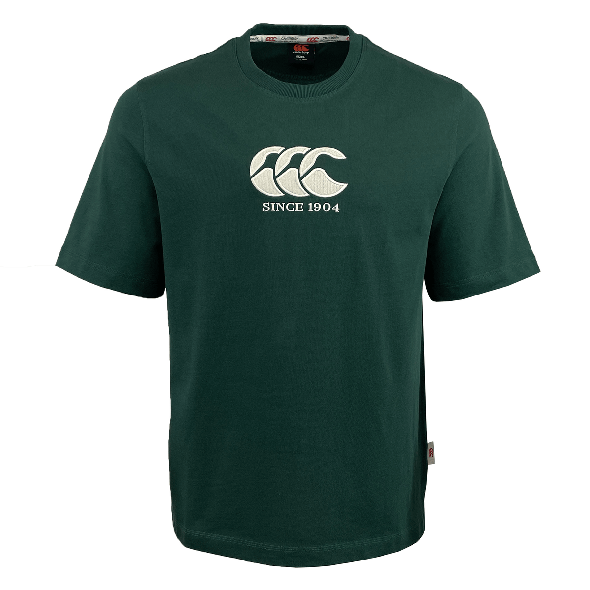 The Canterbury Heritage CCC T-Shirt by Canterbury is crafted from organic cotton in dark green, featuring a white logo of three overlapping shapes above "SINCE 1904," capturing the brand's timeless appeal.