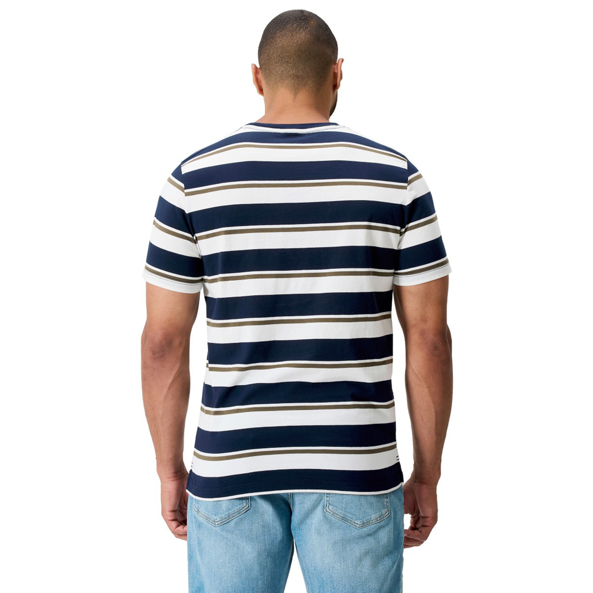 A man faces away wearing the Canterbury Fundamental Yarn Dye Stripe T-Shirt in navy, white, and beige with light blue jeans, set against a white background.