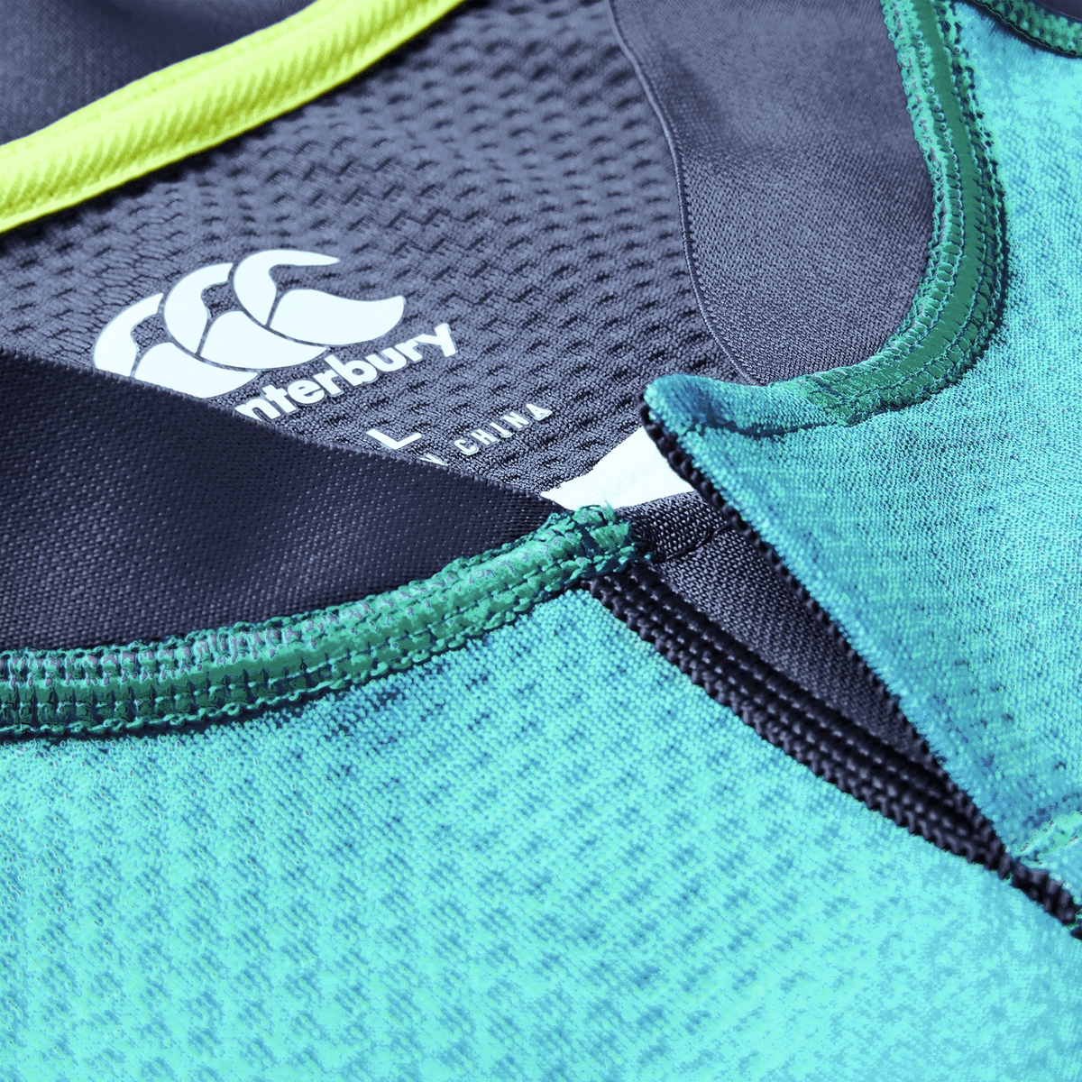 Close-up of the Ireland 26/27 Summer Tour "Baltic" Training Test Jersey by Canterbury, highlighting stitching, textured fabric, brand logo, and label—perfect for fans after an authentic Canterbury IRFU training jersey.
