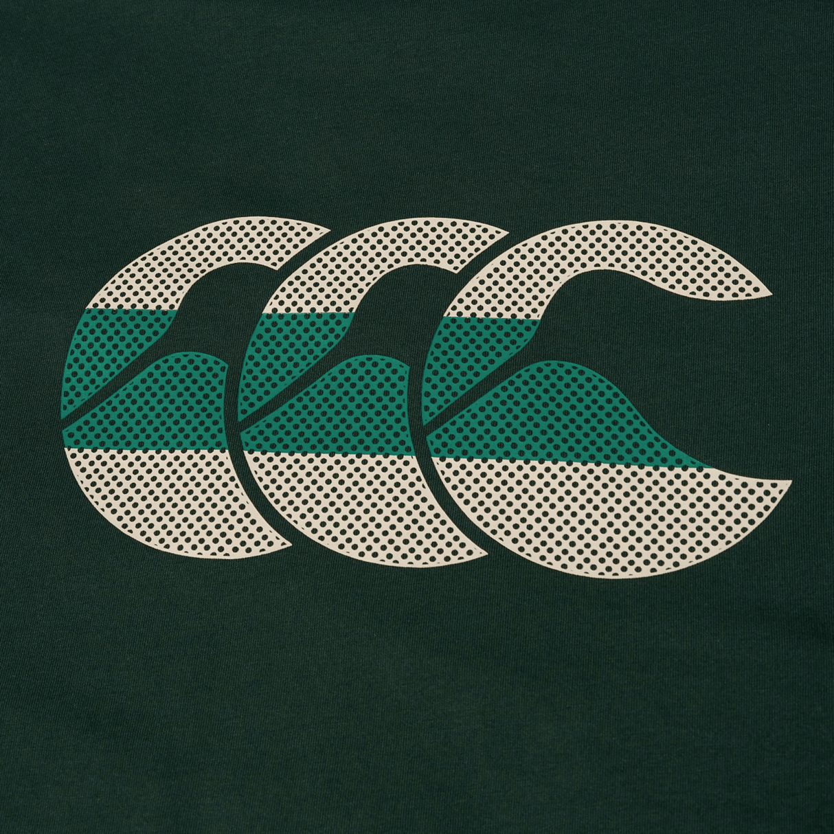 The Canterbury FUN. T-SHIRT AM features three white and green "C" shapes with a dotted pattern in a row on a dark green background, capturing Canterbury spirit—ideal for a fun, stylish tee.