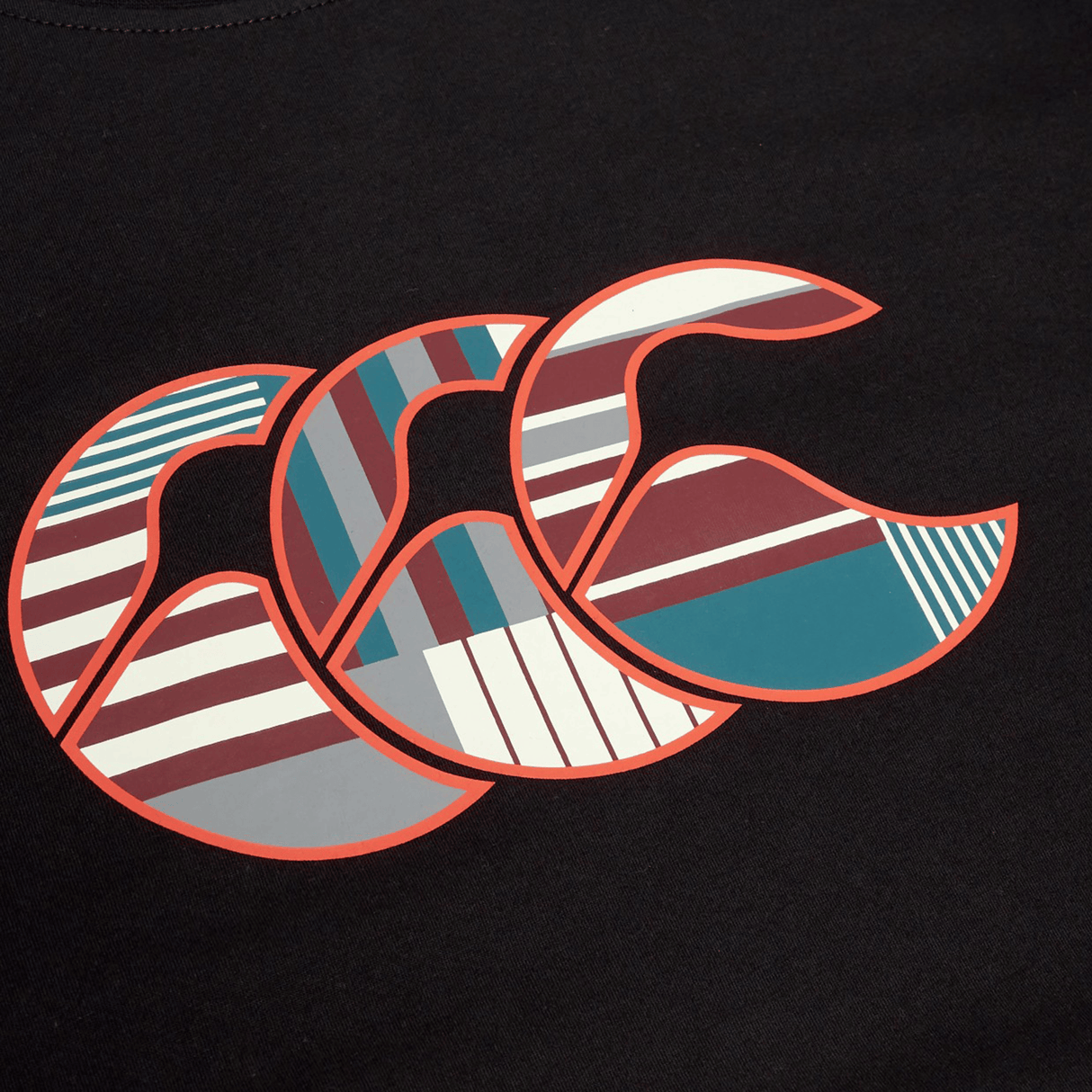Three overlapping stylized “C” shapes with red outlines and bold geometric patterns in blue, maroon, white, and gray on black, inspired by the Canterbury Uglies Logo T-shirt's distinctive Canterbury design style.