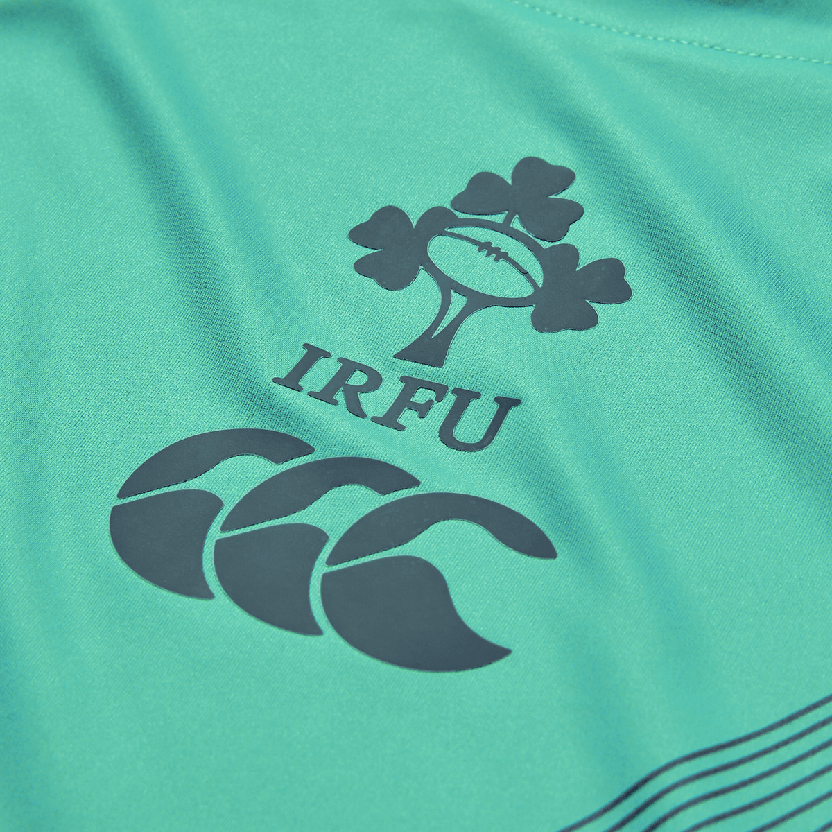 Close-up of the Ireland 26/27 Summer Tour Superlight Training Tank by Canterbury, featuring the IRFU logo above the Canterbury brand—ideal for fans seeking an official lightweight Ireland training tank.