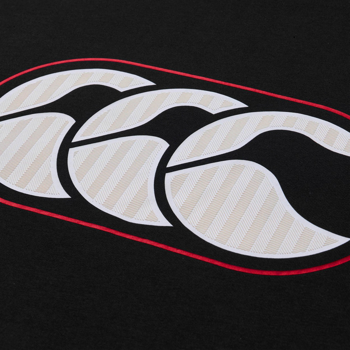 White stylized overlapping shapes outlined in red on a black background, reminiscent of the iconic Canterbury logo, capture the timeless style of classic New Zealand rugby apparel—making them perfect inspiration for the Canterbury Rakaia 2.0 T-shirt from Canterbury.