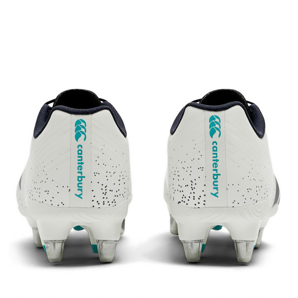 Rear view of the Canterbury Stampede Groundbreak Team SG rugby boots in white and Baltic green, featuring bold blue Canterbury logos, black collar lining, and metal studs—perfect for forwards who need dependable traction on soft ground.
