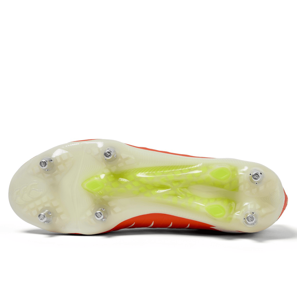 The Canterbury Phoenix 2.0 Elite SG in Tangerine Tango/Snow White features a translucent yellow sole with six metal studs on its orange underside, providing top traction for elite field performance.