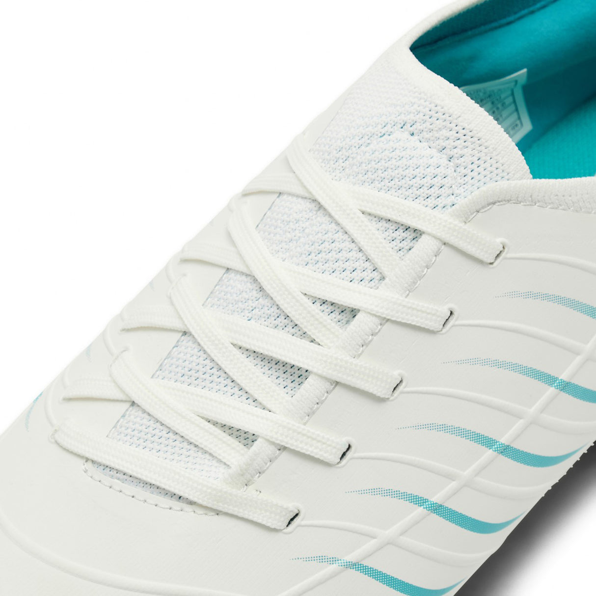 Close-up of the Canterbury Phoenix 2.0 Pro SG rugby boot in White/Baltic Green, featuring white laces and mesh detailing on the tongue and sides—designed specifically as a soft ground boot for forwards.