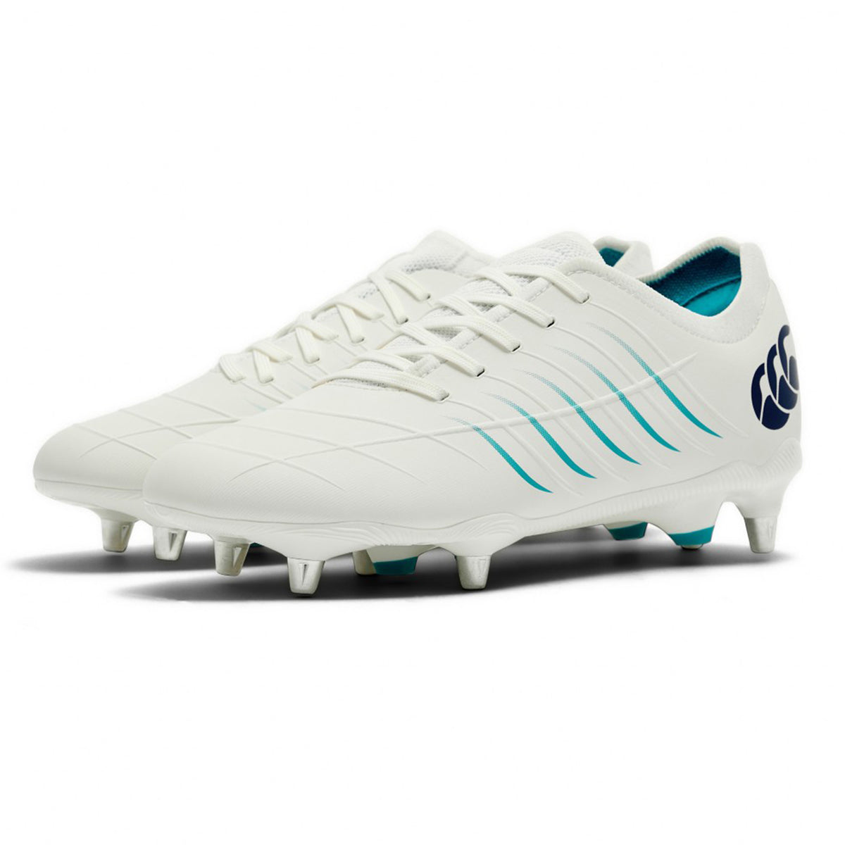 The Canterbury Phoenix 2.0 Pro SG - White/Baltic Green rugby boots from Canterbury are soft ground boots designed with teal (Baltic Green) accents, laces, and metal studs, featuring a large dark blue logo on the heel—perfect for forwards who need grip and stability.