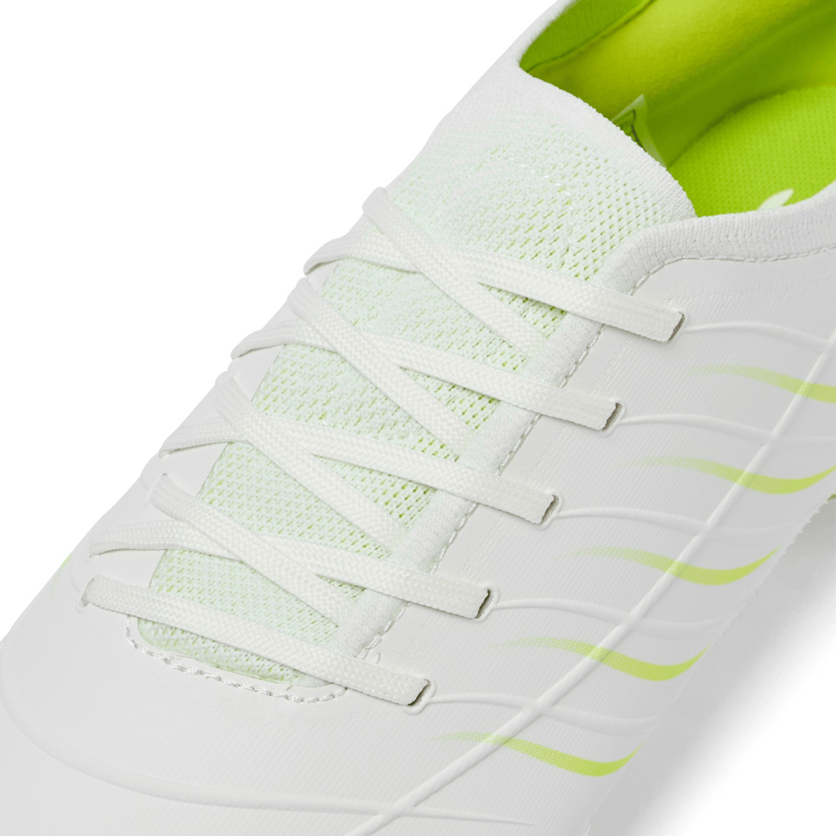 Close-up of the Canterbury Phoenix 2.0 Pro SG rugby boot in Snow White/Tangerine Tango, featuring a mesh tongue, white laces, and a textured synthetic upper—ideal for soft ground performance by Canterbury.