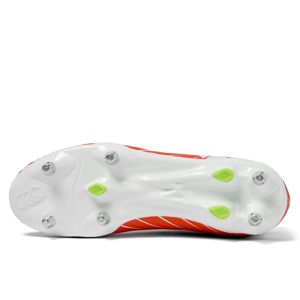 Bottom view of the Canterbury Speed Falcon Pro SG rugby boot in Tangerine Tango/Snow White, featuring a lightweight sole with metal/plastic studs, green accents, textured grip pattern—ideal for agile players.