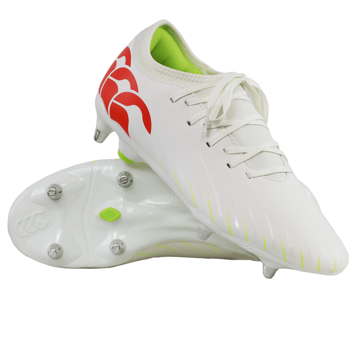 A pair of Canterbury Speed Falcon Team SG soccer cleats in Snow White/Tangerine Tango, featuring a red logo, neon green interior, and metal studs; one shoe stands upright while the other shows its sole.