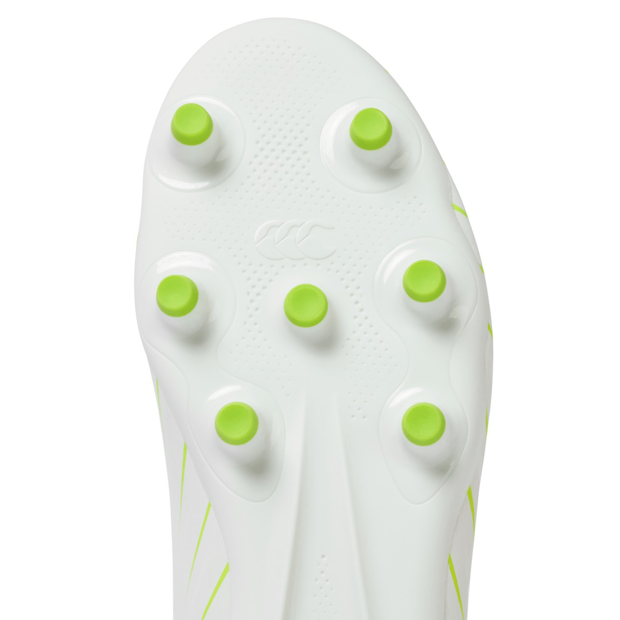 Close-up of the sole of a Canterbury Speed Falcon Team FG soccer cleat in Snow White/Tangerine Tango, highlighting seven green-tipped studs in a circular pattern.