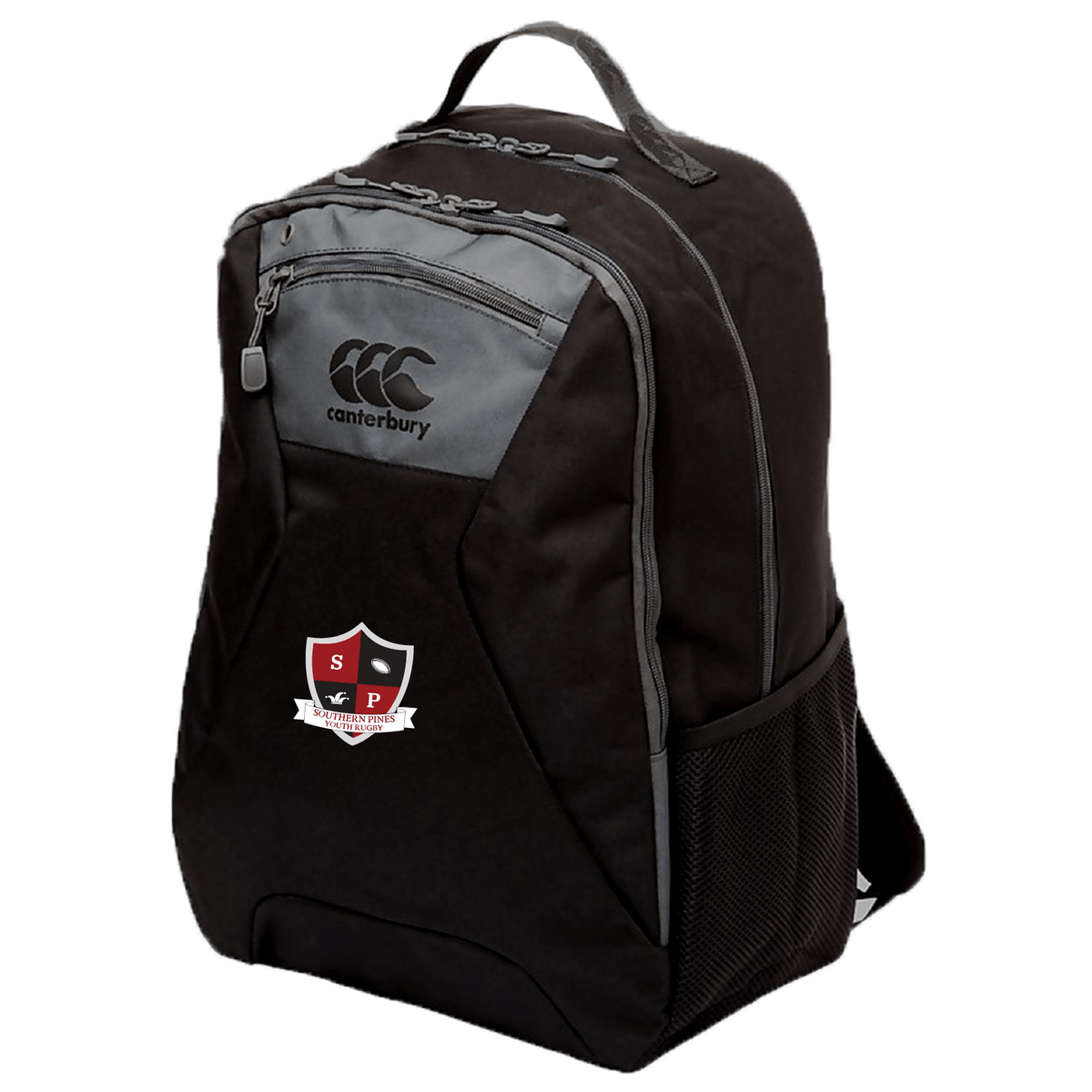 The Southern Pines Youth Rugby Medium Backpack by EMB Canterbury is versatile, available in black and gray with a Canterbury logo, carrying handle, multiple zippers, mesh side pocket, embroidered "SP" shield emblem, and a padded laptop pocket for added convenience.