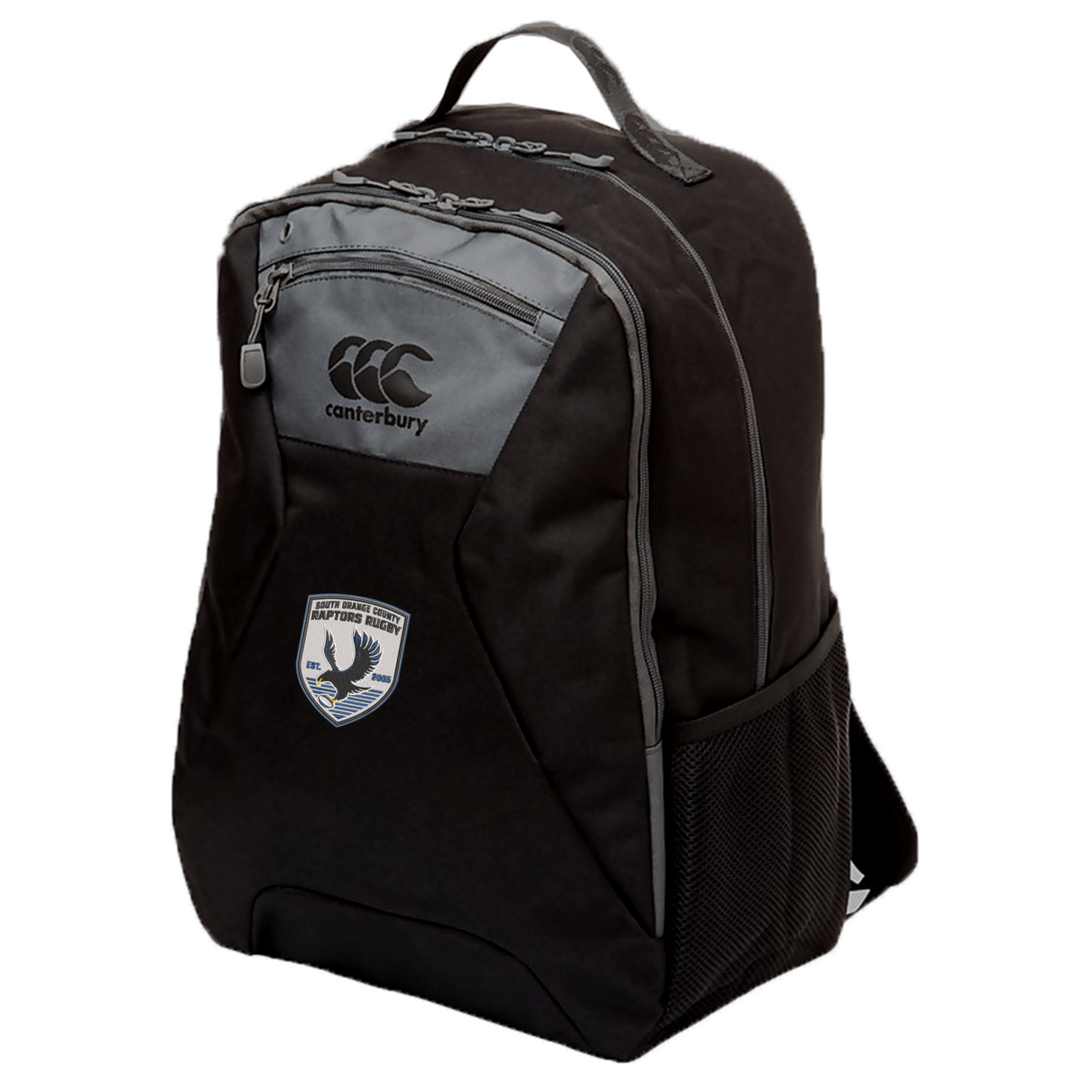 The South Orange County Raptors Medium Backpack by EMB Canterbury features a black and gray design with a front zipper pocket, side mesh pocket, top handle, and a distinctive sports team patch on the front—this athletic gear backpack is crafted to keep your essentials secure for every adventure.
