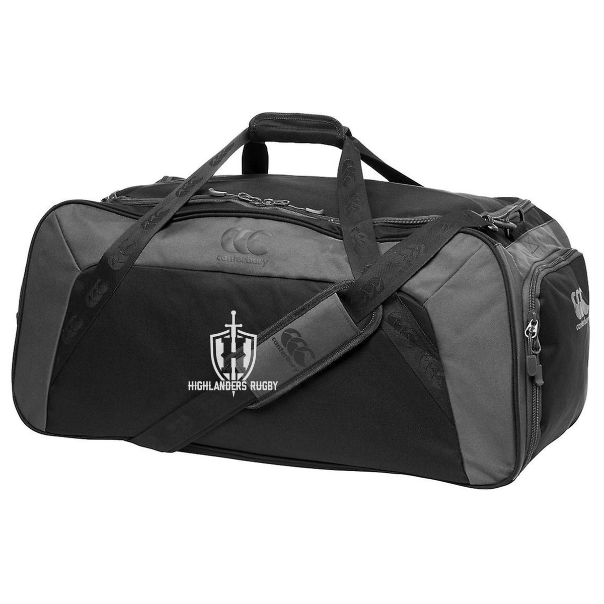 The Highlanders Rugby NC Holdall Duffle Bag by Canterbury from EMB Canterbury is a gray and black duffle bag featuring the Highlanders Rugby logo. It includes handles, an adjustable shoulder strap, and offers water-repellent protection.