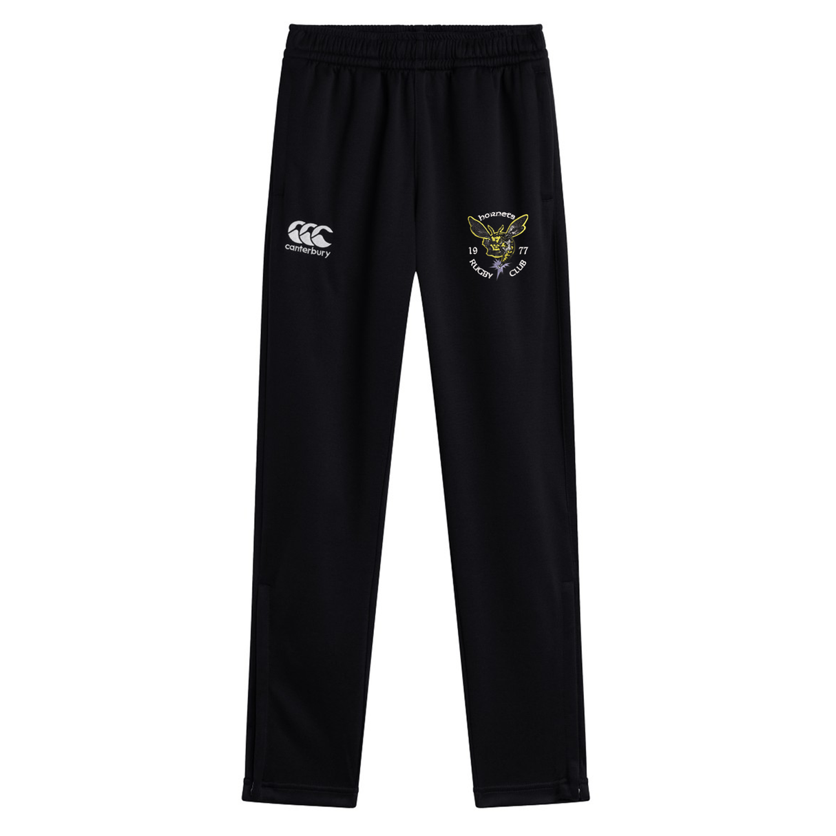 The Hornets Rugby Club 1977 Stretch Tapered Pant by EMB Canterbury features a black athletic design with an elastic waistband, a white Canterbury logo on the left thigh, and an embroidered yellow and white Hornets emblem on the right thigh. Displayed against a white background, these men’s workout pants offer optimal comfort and mobility with their signature Stretch Tapered Pant construction.