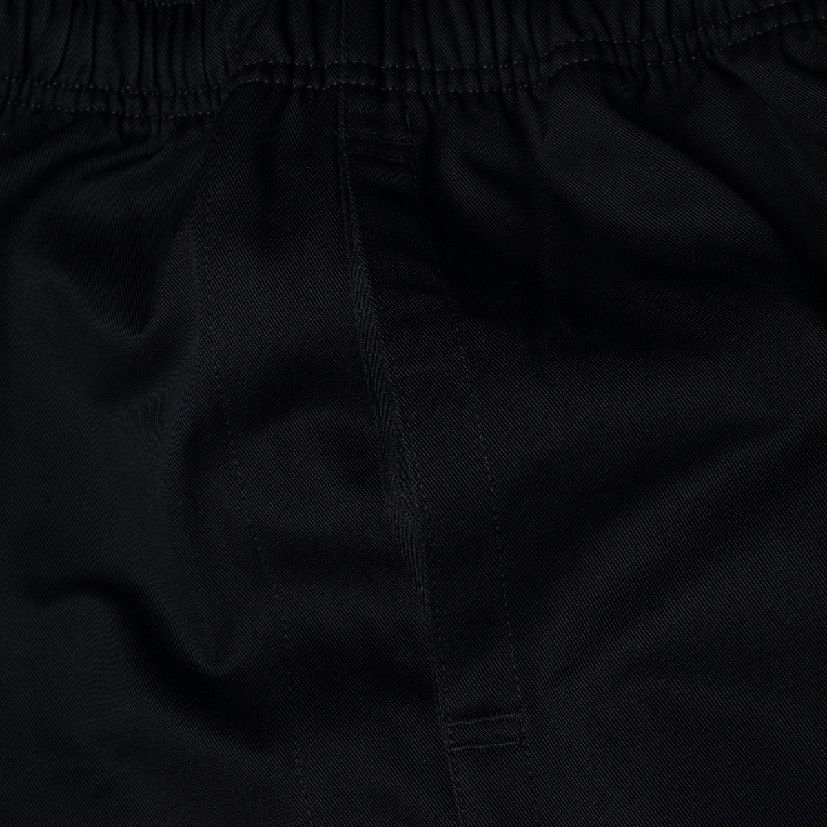 A close up view of the pocket in the Canterbury Professional Cotton Shorts.