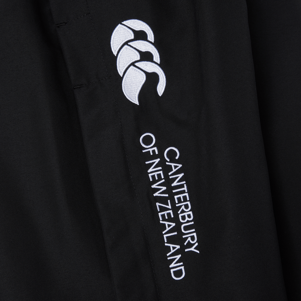A Canterbury Cuffed Hem Stadium Pant with a white logo on it.