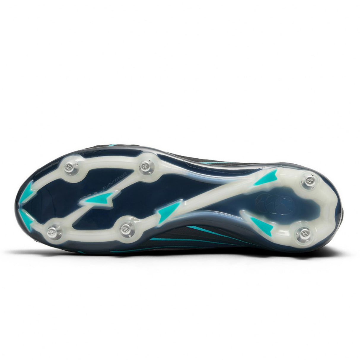 The image shows the bottom view of the Canterbury Speed Falcon 2.0 Elite SG rugby boot by Canterbury in Jet Black/Baltic Green, featuring a dark blue sole with white accents and turquoise arrow-shaped designs, along with metal studs for traction on soft ground.