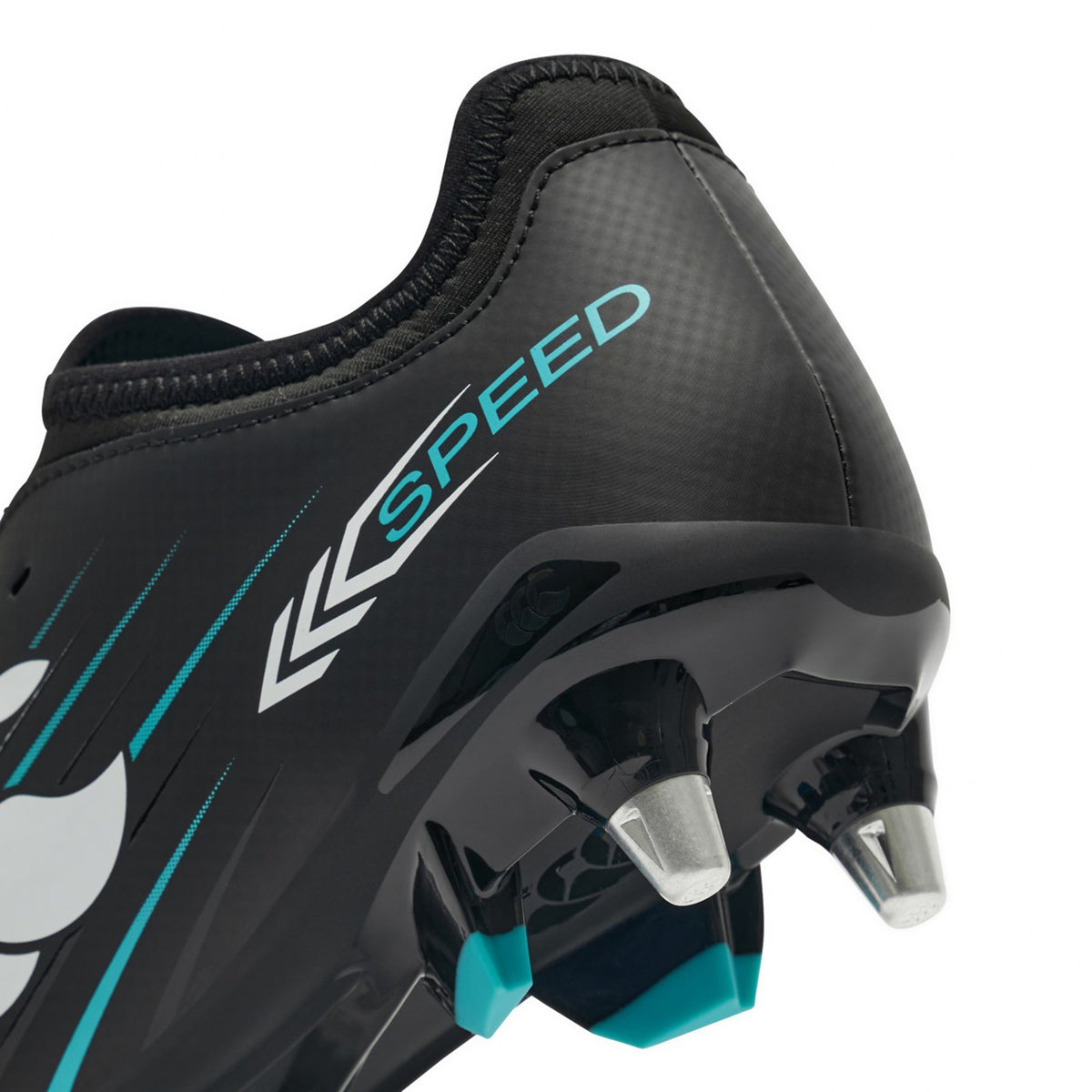 Close-up of the heel of the Canterbury Speed Falcon 2.0 Team SG soccer cleat in Jet Black and Baltic Green, featuring metallic studs and "SPEED" printed in blue and white on the side. This lightweight Canterbury cleat is designed for optimal soft-ground performance, making it an excellent budget-friendly choice for football players seeking quality boots.