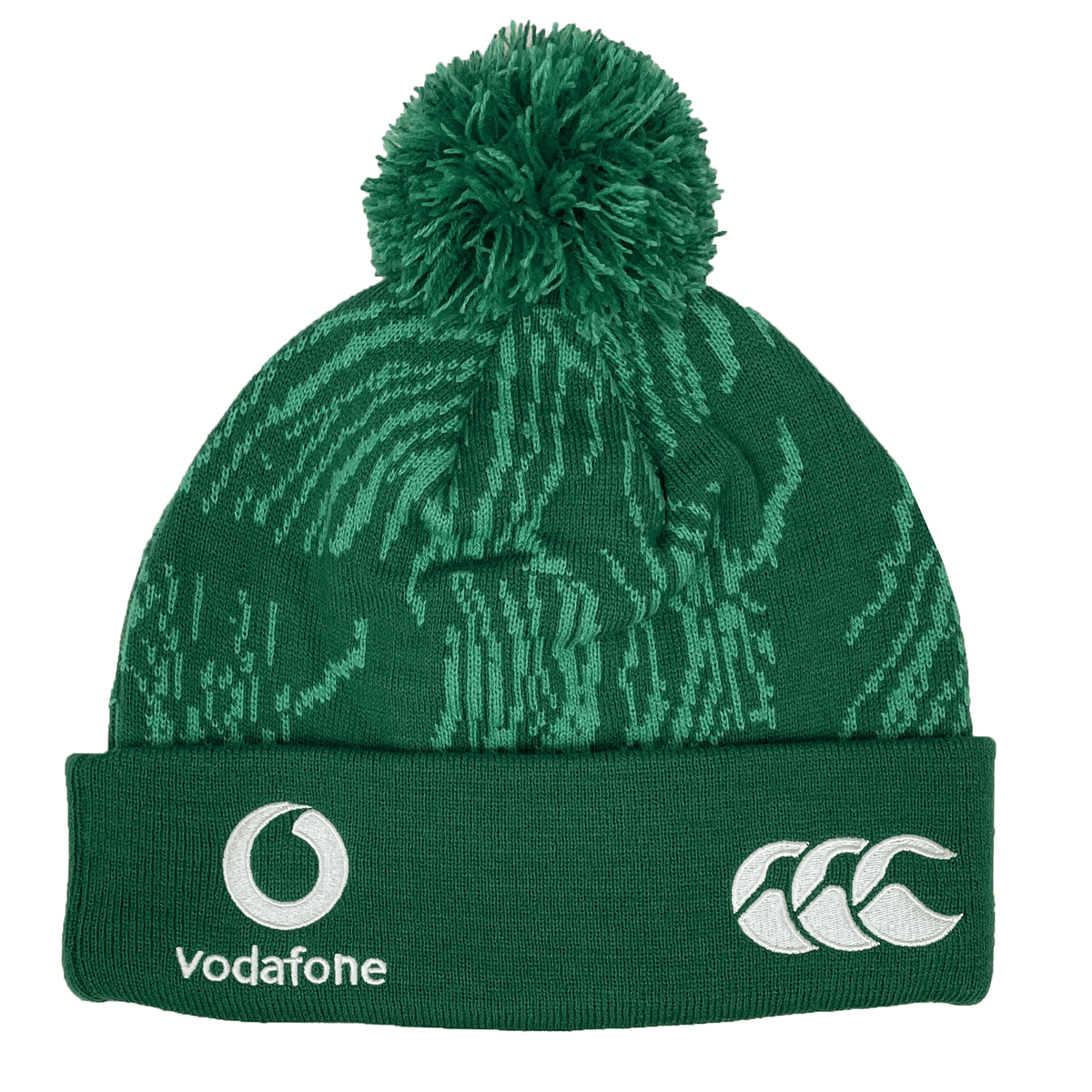 The Ireland 24 IRFU Bobble Hat by Canterbury, featuring a green color with a pom-pom and adorned with Vodafone and CCC logos on the front, embodies team spirit and style.